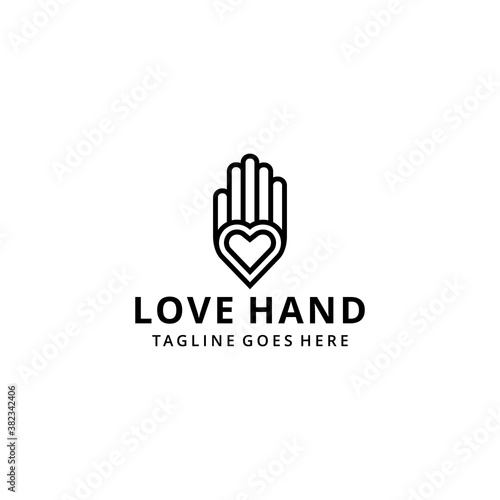Illustration hand holding a heart or love sign logo design  © is