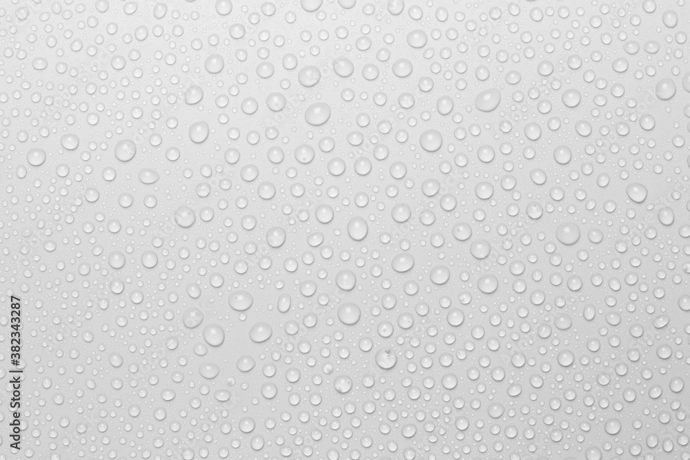 The concept of raindrops falling on a gray background Abstract wet white surface with bubbles on the surface Realistic pure water droplet water drops for creative banner design The concept of raindrops falling on a gray background Abstract wet white surface with bubbles on the surface Realistic pure water droplet water drops for creative banner design
