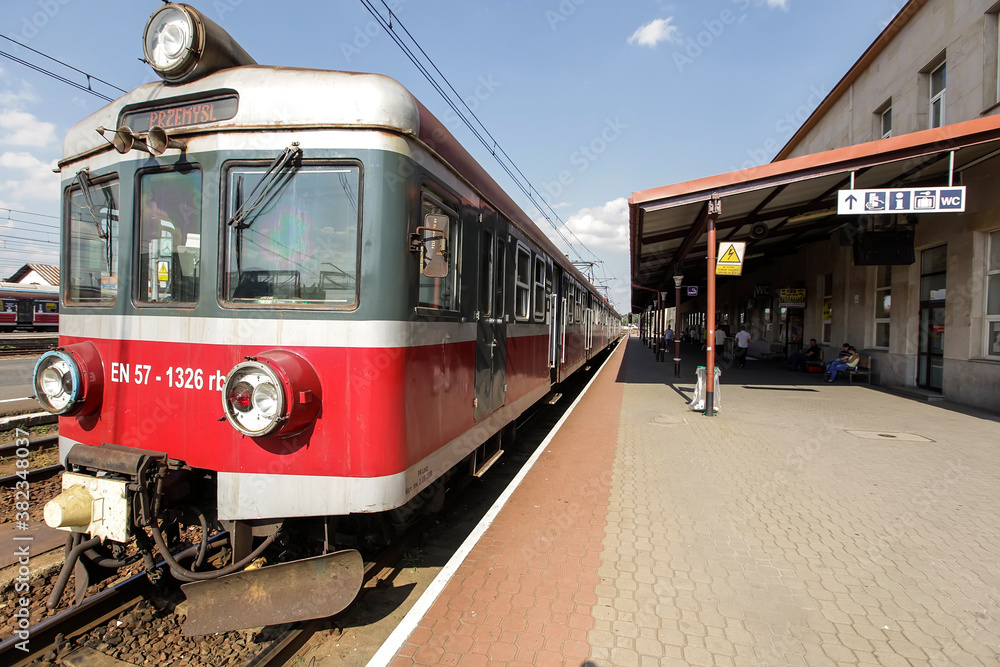 Red retro train at the Rzeszow Glowny railway station. June 2020