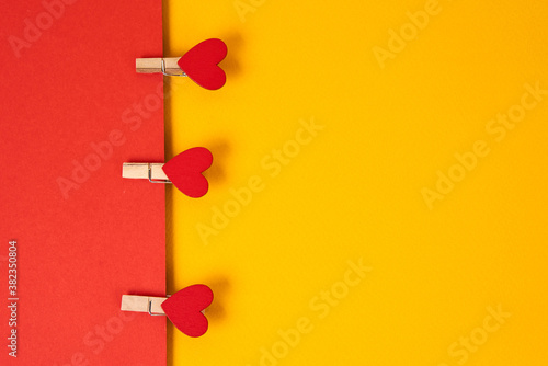Hearts on a clothespin two-color background Copy Space free space