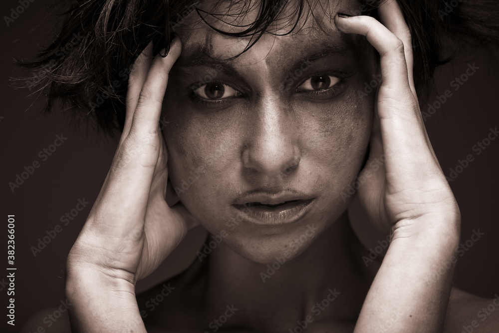 Sadness - young woman in depression.Creative make-up. Sadness - young woman in depression.Creative make-up.