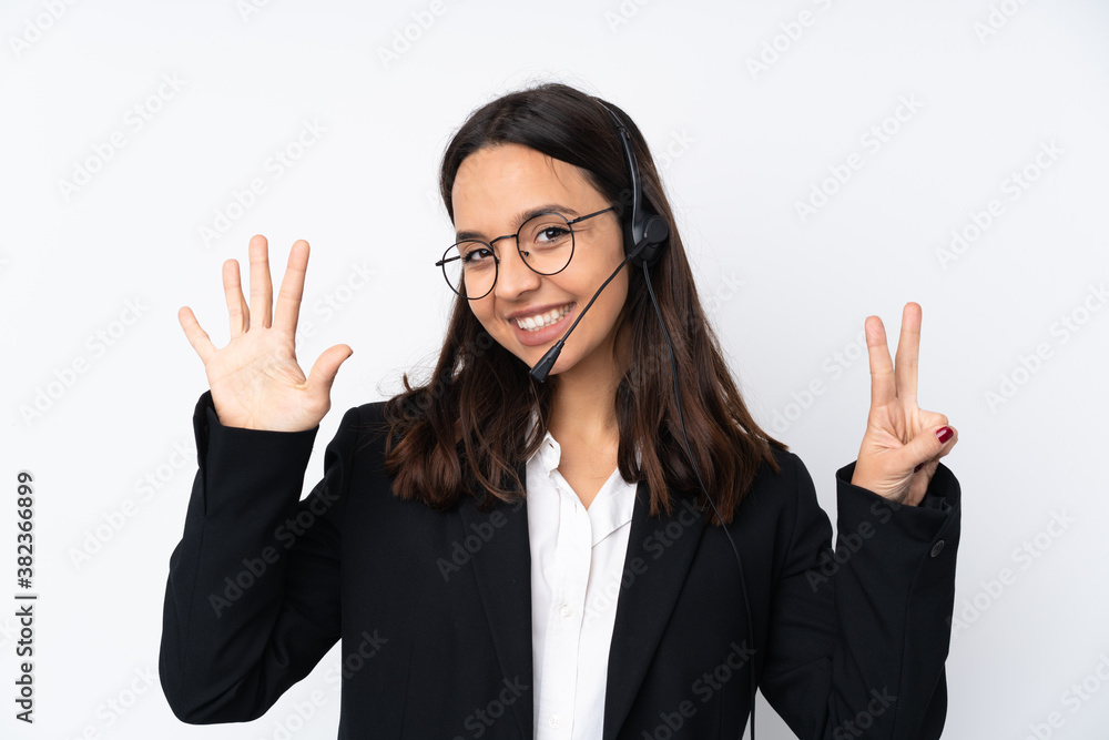Young telemarketer woman isolated on white background counting seven with fingers Young telemarketer woman isolated on white background counting seven with fingers