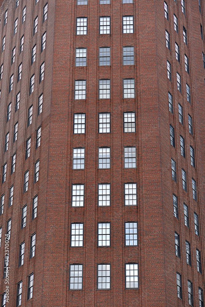 Fototapeta premium Old red building in NYC close up