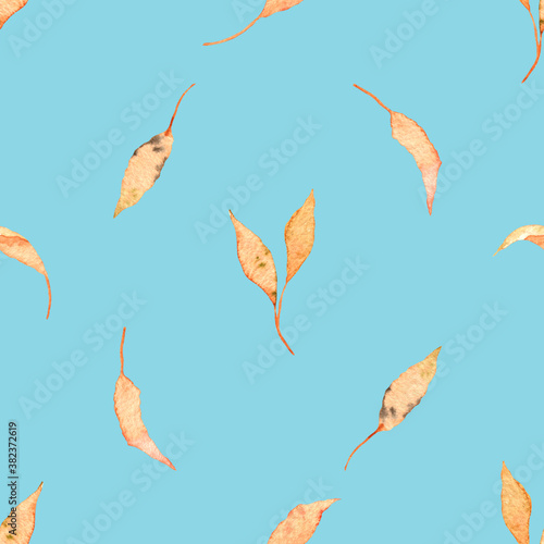 Watercolor seamless pattern with autumn leaves on a blue background, hand-drawn. For Wallpaper, textiles, invitations, wrapping paper, scrapbooking.