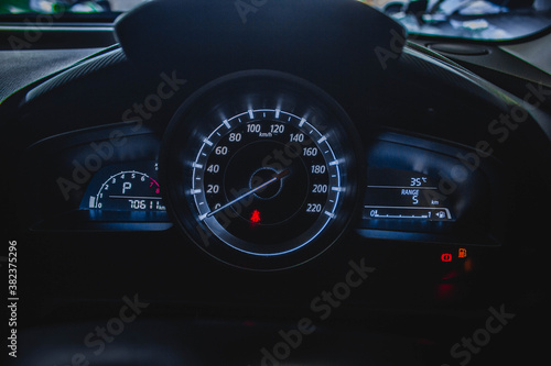 car​ instrument panel, car​ speen motor of​ night, car​ dashboard​ modern​ automobile control​illuminated panel​ speed display. © Muanpare