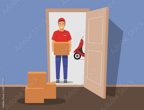 Delivery of goods. Courier in gloves with box in hands.Man with delivery motorbike in the background.