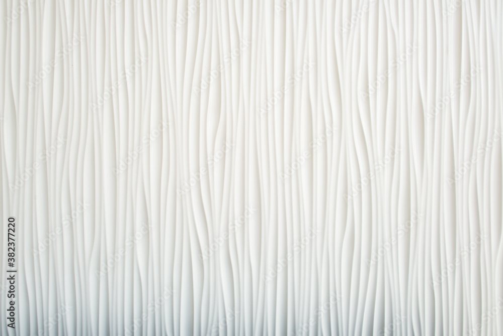 Weisse Holzwand mit feiner Oberflächenstruktur