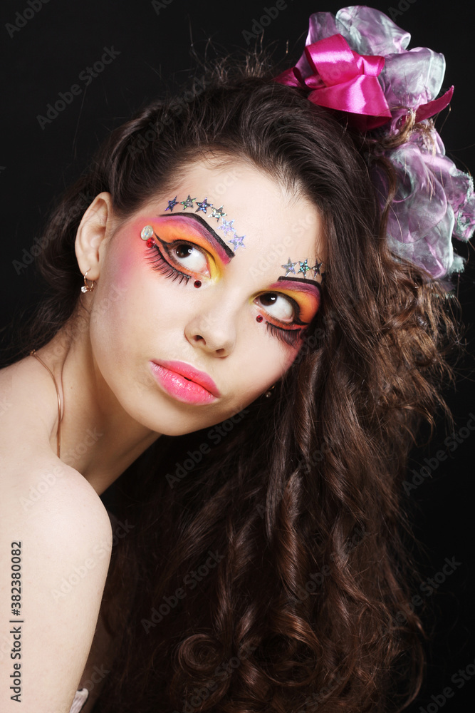 Fototapeta premium Beautiful lady with artistic make-up.
