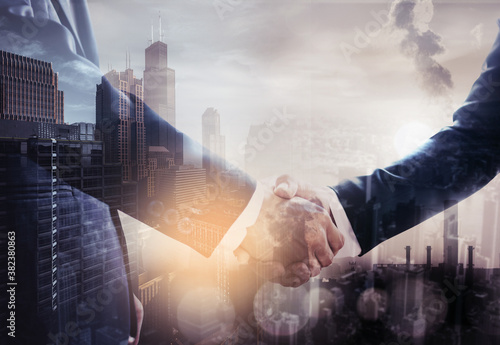 Double exposure of Business people in thoiughful agreement