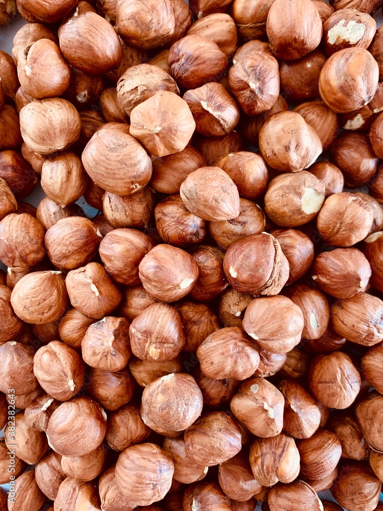 Hazelnut Background. Heap of peeled hazelnuts. Hazelnut Background. Heap of peeled hazelnuts.