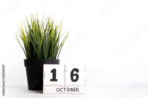date on a wooden background, October