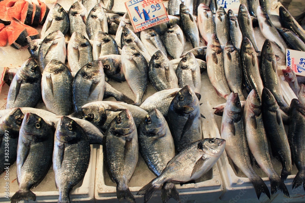 Obraz premium Stalls with sea food at fish market in Athens, Greece, July 27 2020.