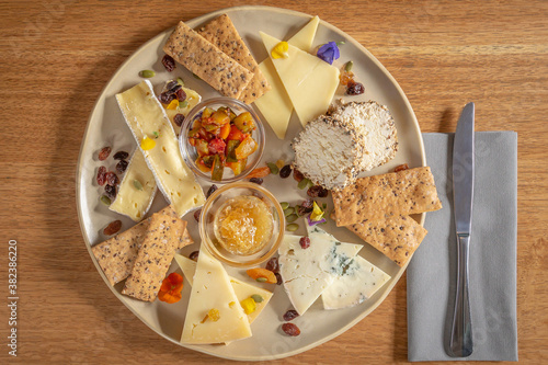 Cheese platter with relish, chutney and crackers