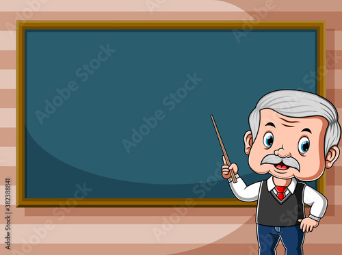 The teacher is teaching in front of the class beside the black board