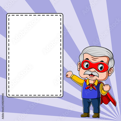 The teacher using the superhero costume standing near the blank