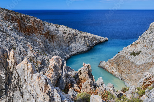 View of z-shaped bay, Greek landscape. Blue sky, beautiful clouds, sunny day. Azure sea. Seitan Limania, Akrotiri, Chania region, Crete island, Greece photo