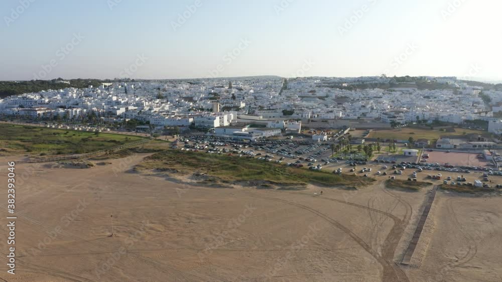 Paseo Maritimo of Conil and white town aerial panorama video Paseo Maritimo of Conil and white town aerial panorama video