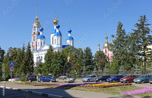 Cathedral of the Kazan Icon of the Mother of God and the Bell Tower of Kazan Monasteryin in Tambov Russia on a summer day photo