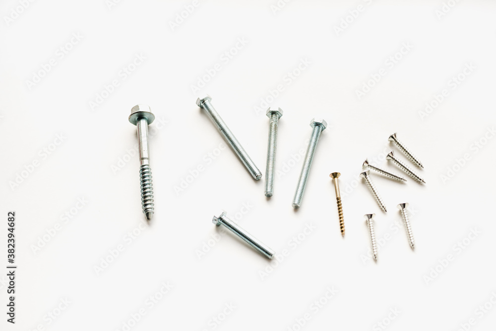 bolts with nuts on a white background, bolts and nuts bolts with nuts on a white background, bolts and nuts