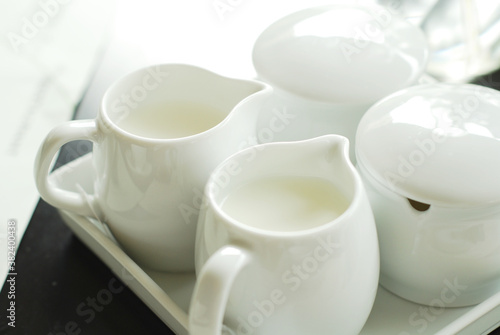 White Cup of Milk on a light Background