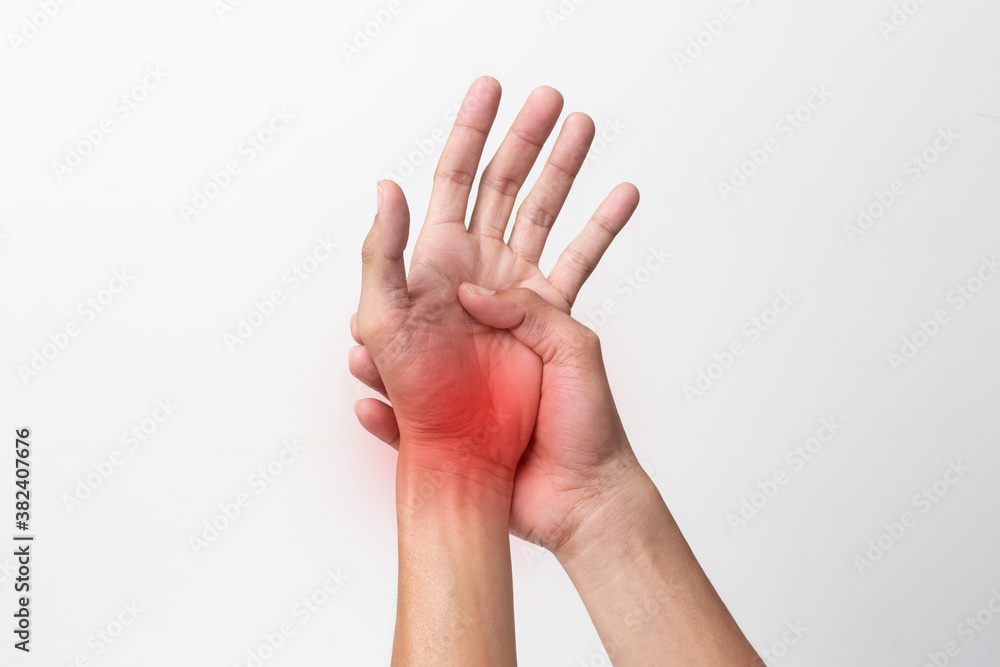 hand man suffering from pain in the wrist and fingers isolated on white background.with clipping path hand man suffering from pain in the wrist and fingers isolated on white background.with clipping path