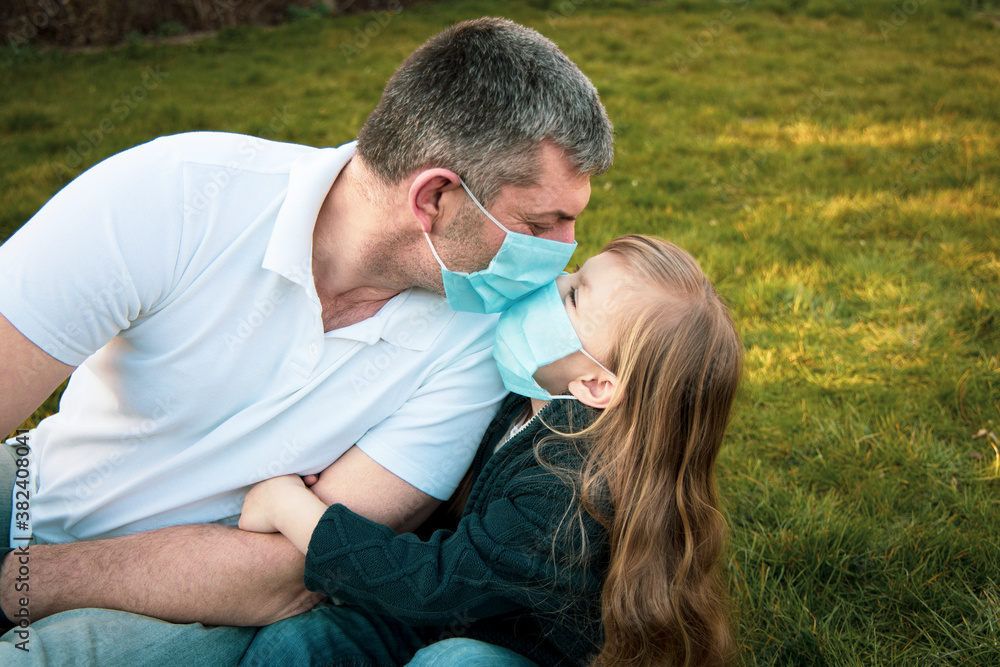 People in medical masks. Daddy daughter in medical masks.
People in medical masks. Daddy daughter in medical masks.