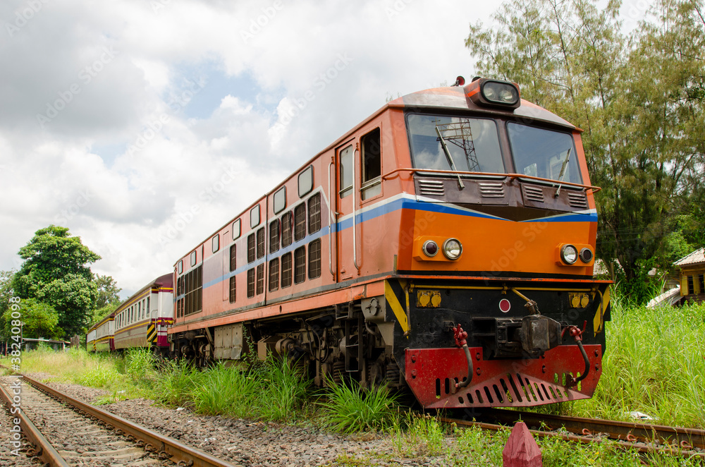 Obraz premium Train engines pulling trains out of Thailand