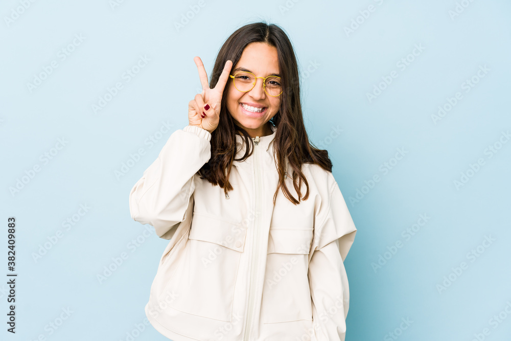 Young mixed race hispanic woman isolated showing number two with fingers. Young mixed race hispanic woman isolated showing number two with fingers.