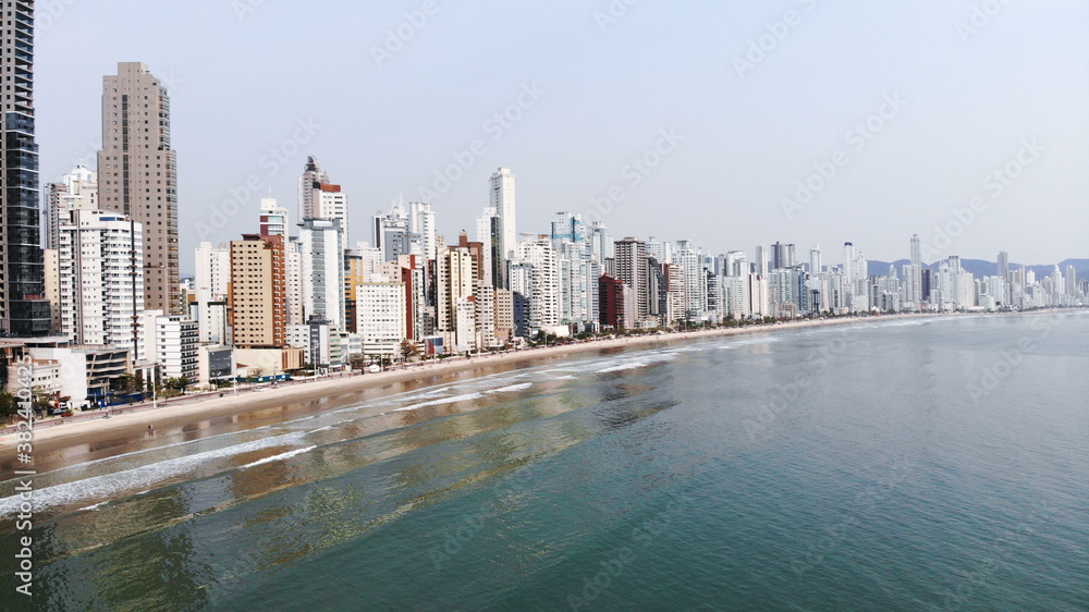 Fototapeta premium The big buildings of Balneário Camboriú beach. One of the biggest city of Santa Catarina, south of Brazil. Drone photography.
