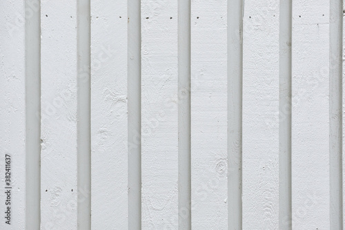 Obraz na płótnie The modern white wooden wall of the building. The pattern of wooden wall. w salonie