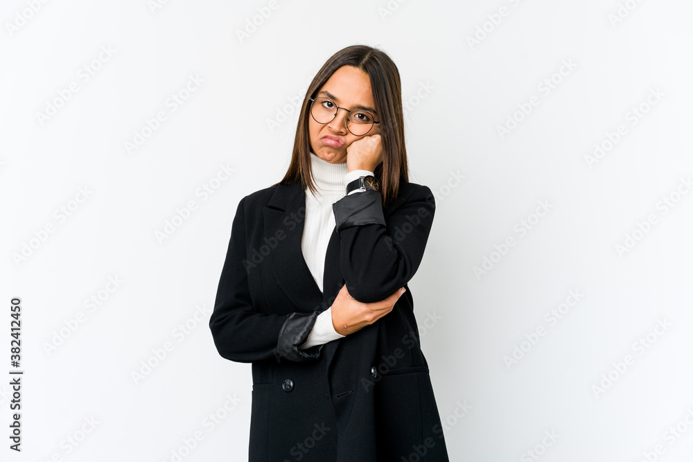 Young mixed race business woman isolated on white background who feels sad and pensive, looking at copy space. Young mixed race business woman isolated on white background who feels sad and pensive, looking at copy space.