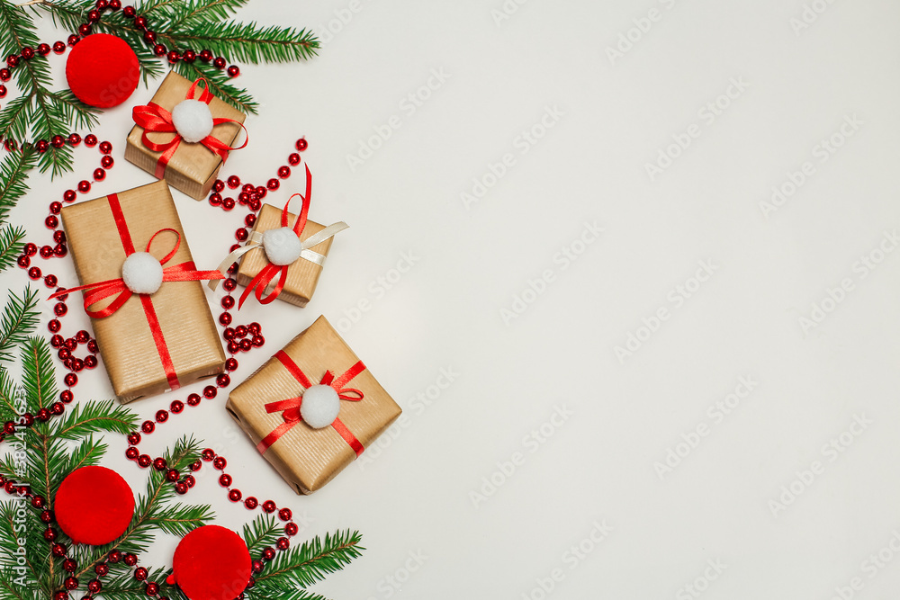 Christmas composition. gifts, fir branches, red ornaments. winter, new year's concept. flat layout, isometry, space for text Christmas composition. gifts, fir branches, red ornaments. winter, new year's concept. flat layout, isometry, space for text