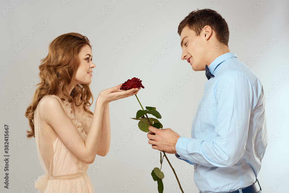 lovers men and woman hugs romance love red rose light background lovers men and woman hugs romance love red rose light background