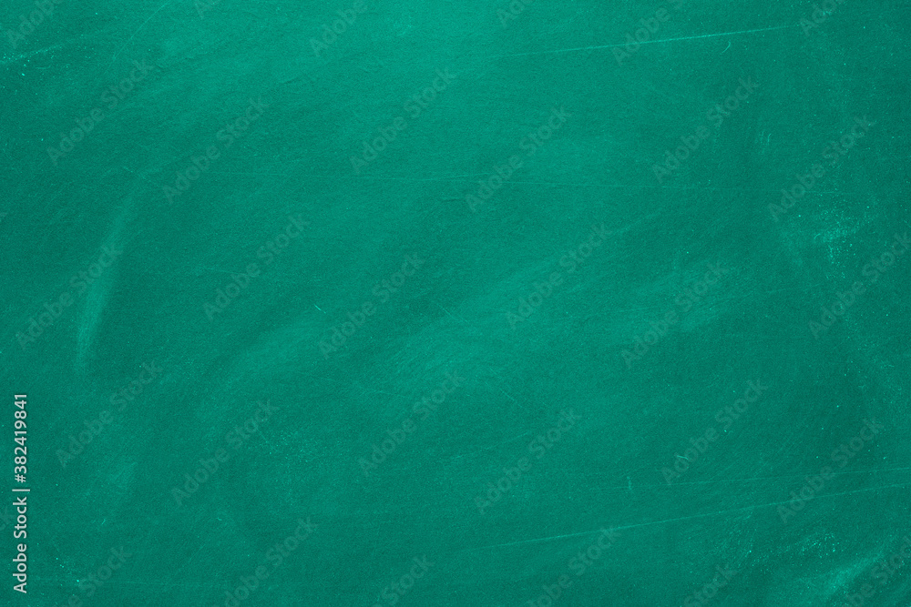 Obraz premium Texture of chalk rubbed out on blackboard or chalkboard background. School education, dark wall backdrop or learning concept.