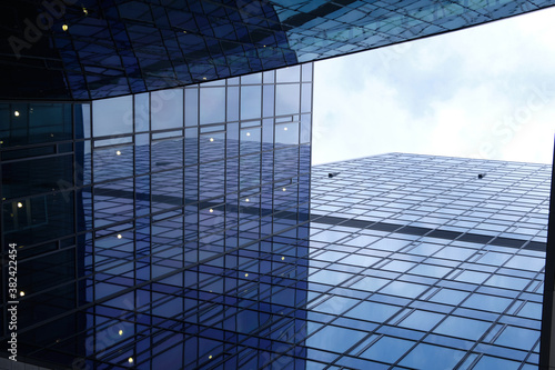 Low angle view of modern office buildings with sky