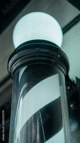 Close View of Traditional Black and White Barber Shop Light in Mexico City photo