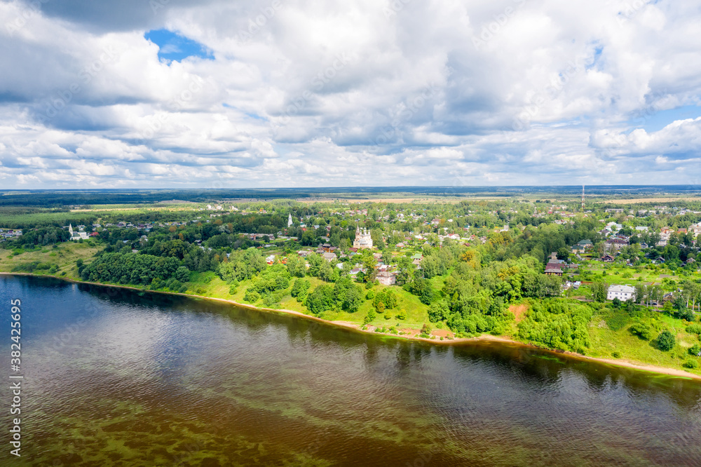 Top view of the Romanovskaya side of the city of Tutaev on a summer day