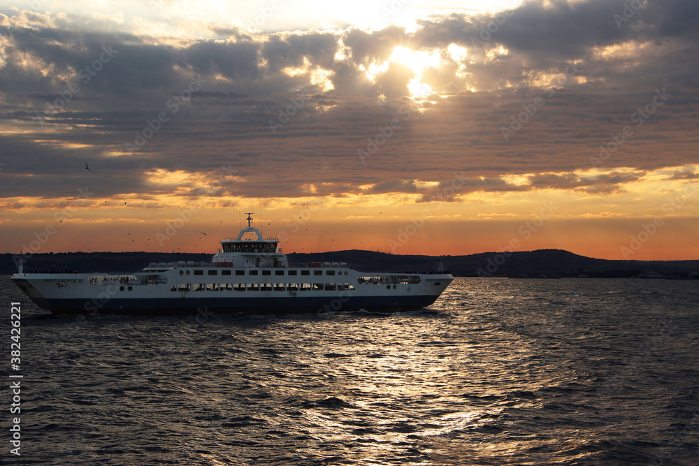 ferry at sunset
