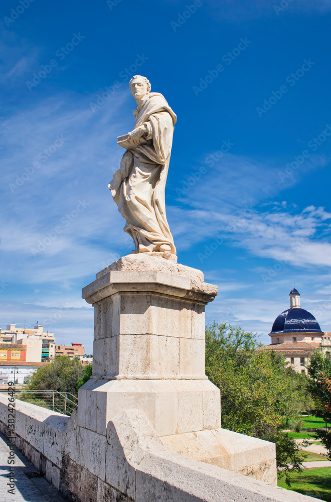 Sculptural detail of a saint on the Trinidad bridge in Valencia