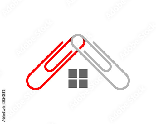 Two paperclip form a roof house with window in the middle