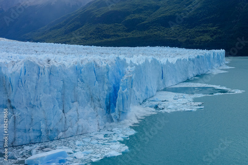 A 70 meter tall slab of ice from the Perito Moreno glacier calves away from the southern Patagonia ice sheet near the town of El Calafate in southern Argentina