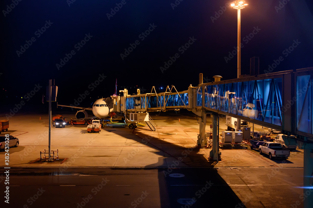 Aircraft parking at night with AeroBridge