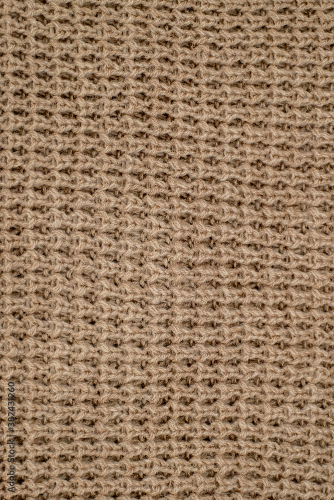 The texture of a knitted woolen fabric The texture of a knitted woolen fabric