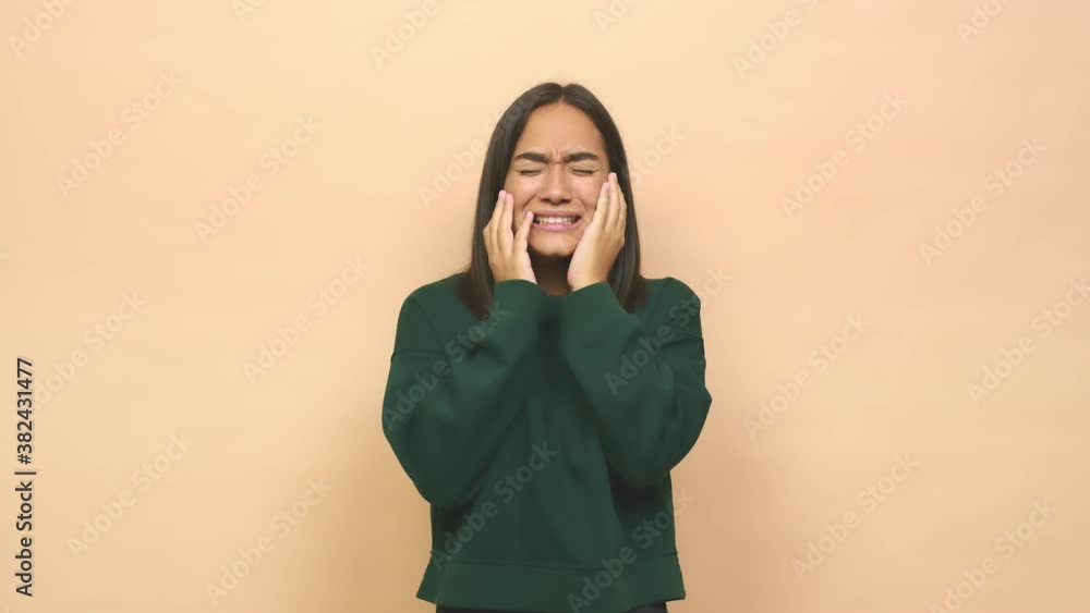 Young mixed race indian woman whining and crying disconsolately Young mixed race indian woman whining and crying disconsolately