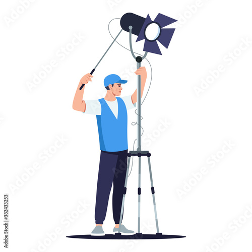 Lightning technician semi flat RGB color vector illustration. Man holding light. Film shooting environment. Famous movie filming crew member isolated cartoon character on white background