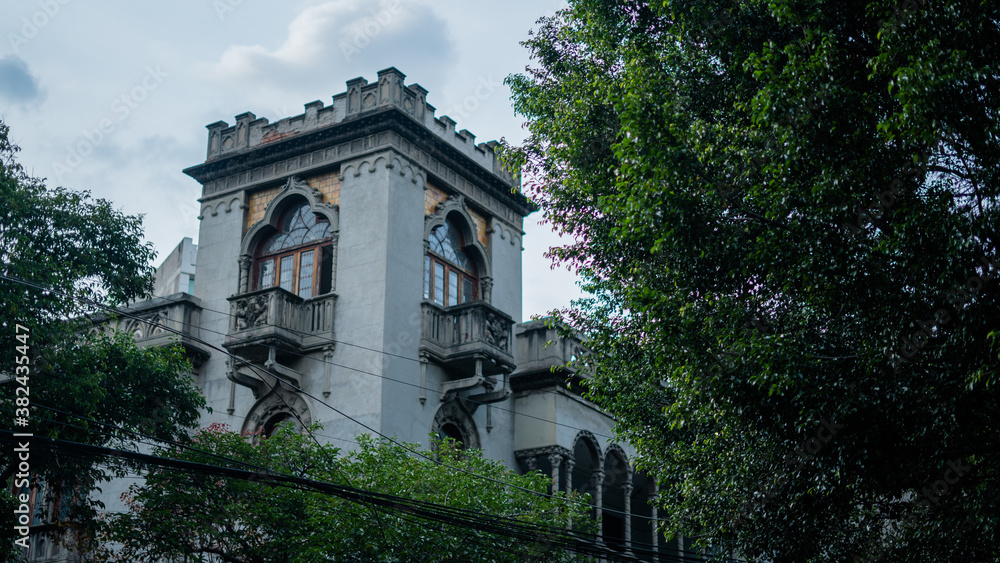 Medieval Looking Building Behind Some Trees in Mexico City Medieval Looking Building Behind Some Trees in Mexico City