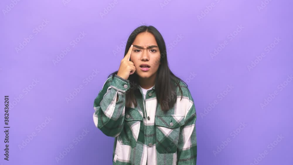 Young mixed race indian woman showing a disappointment gesture with forefinger Young mixed race indian woman showing a disappointment gesture with forefinger