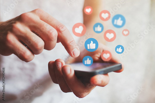 Obraz na plátne social media concept, likes on social network coming from smartphone screen