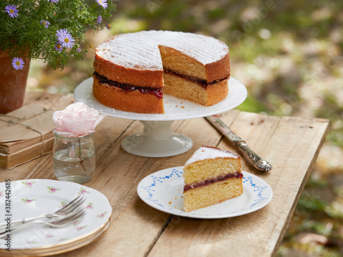 Tableau sur toile English afternoon tea in the garden with Victoria sponge cake.