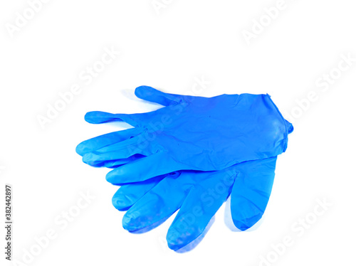 Blue surgical glove isolated on white background. Protective gloves. Medical item